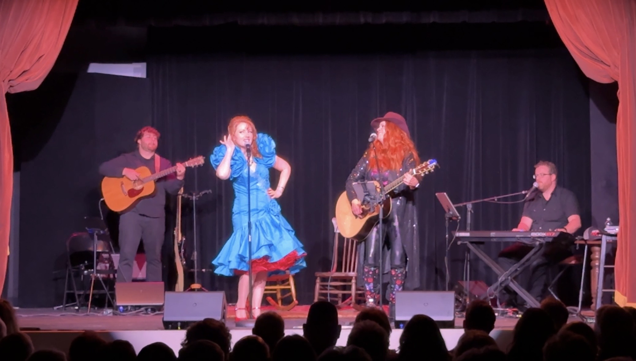 Liz on stage in Medora, crowd singing along